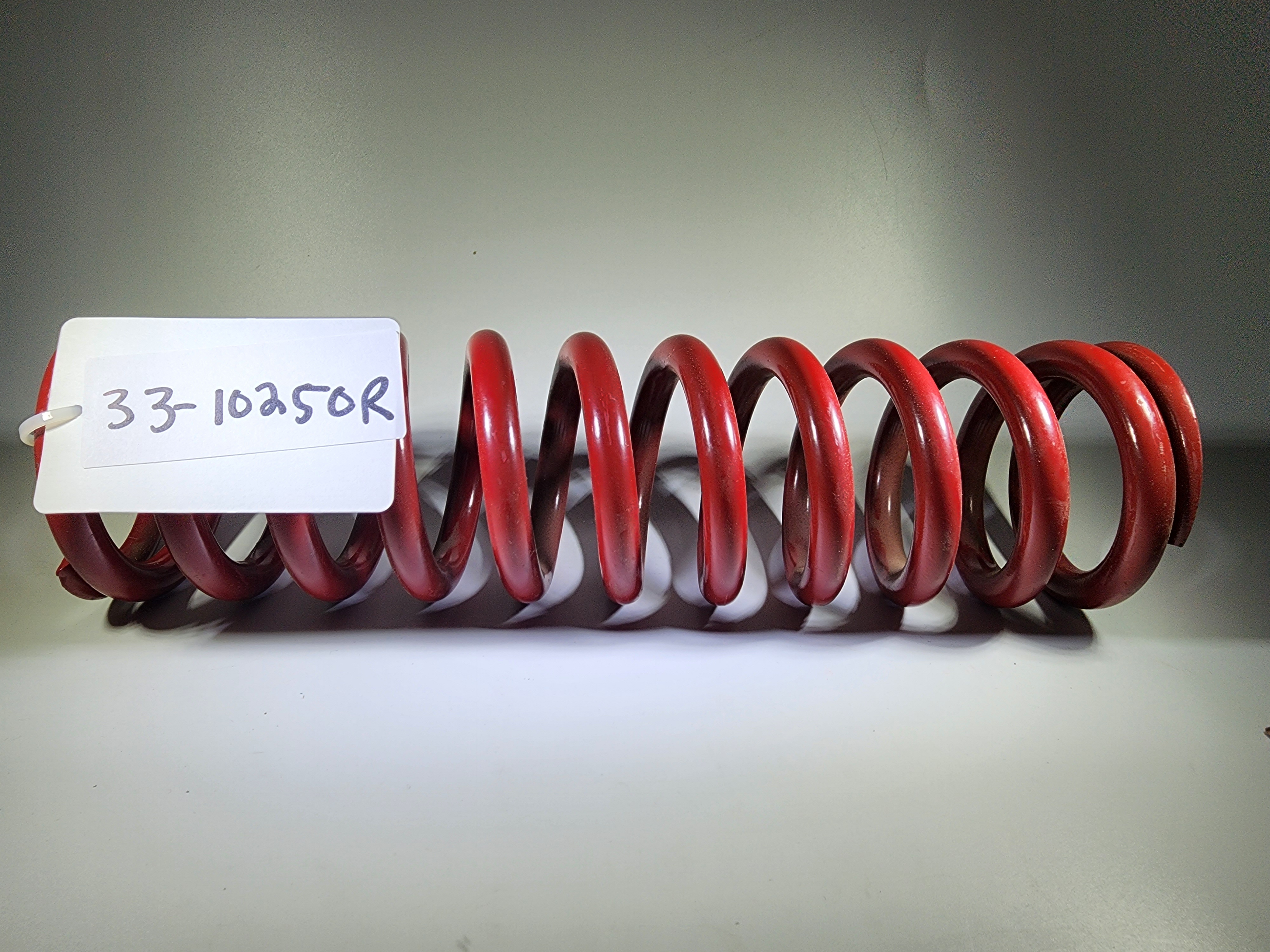 Spring: (T) [10.0 TLG X 1.880 ID  X 250.70 lbs/in] Red