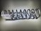 Spring: (T) [12.000 TLG X 2.500 ID X 100 lbs/in] Silver